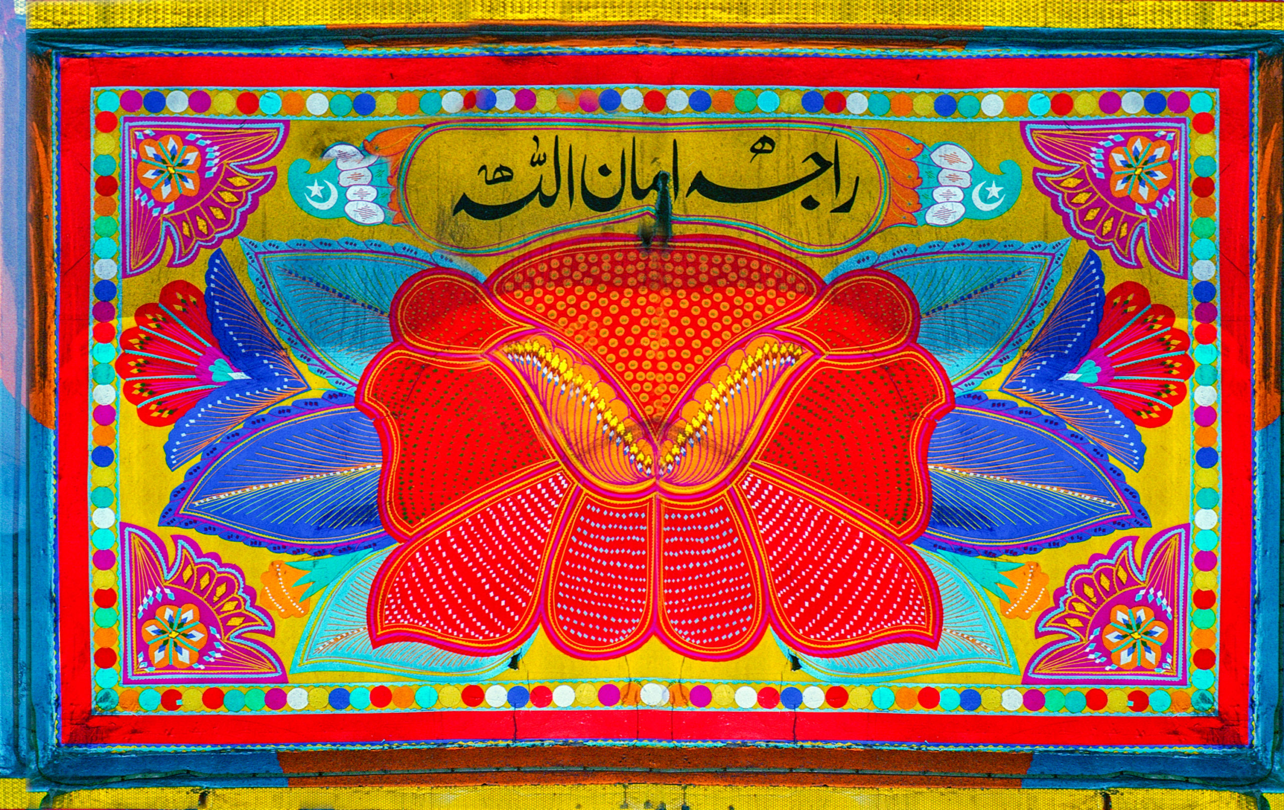 Colorful painting on the back of a Pakistani Bedford truck