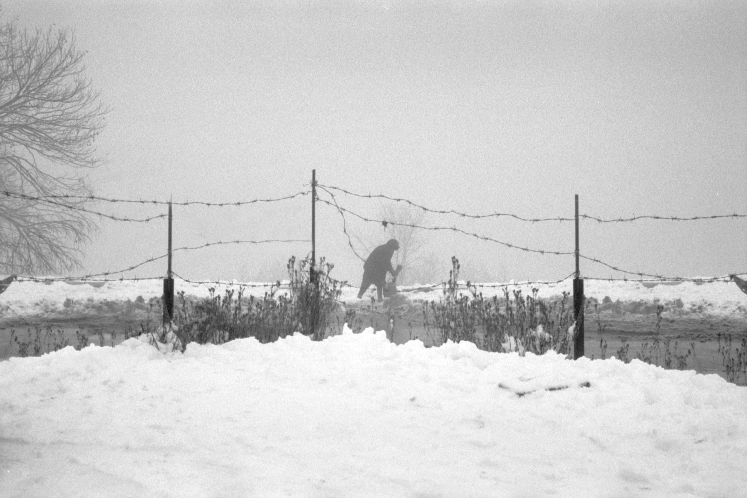 The silhouette of a man seen in the snow