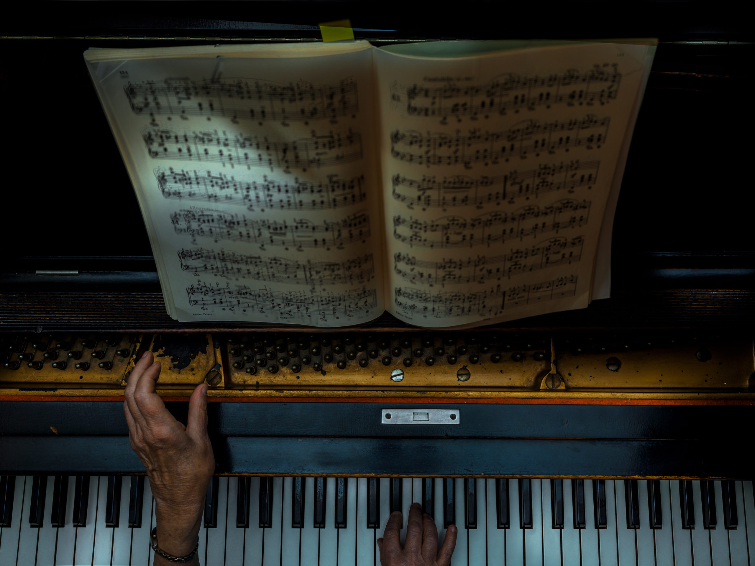 A pianist plays a musical piece